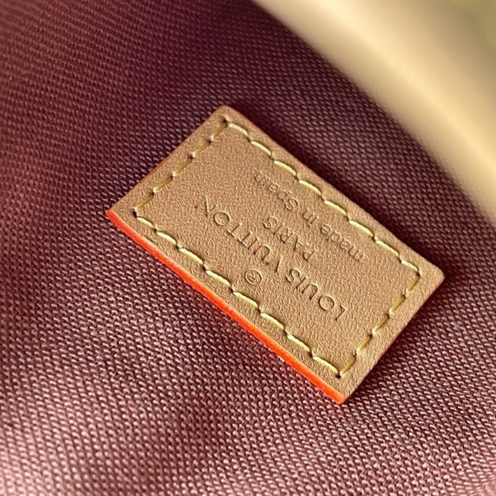 LV fold me clutch bag